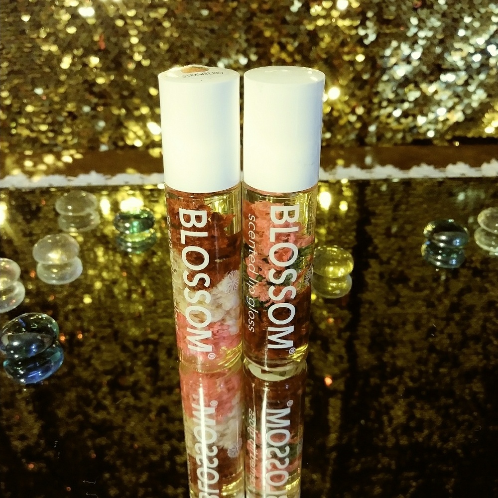Blossom scented lip glosses. Waterm and strawberry